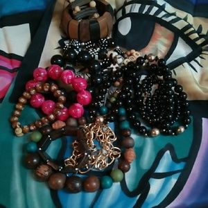 Lot of necklaces and bracelets. All wearable